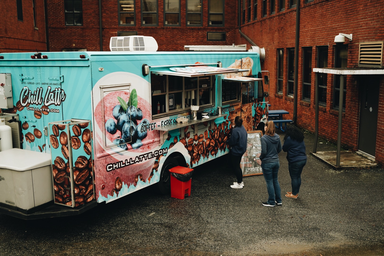 school teachers are ordering cappuccinos and espresso coffee from the chill latte coffee truck